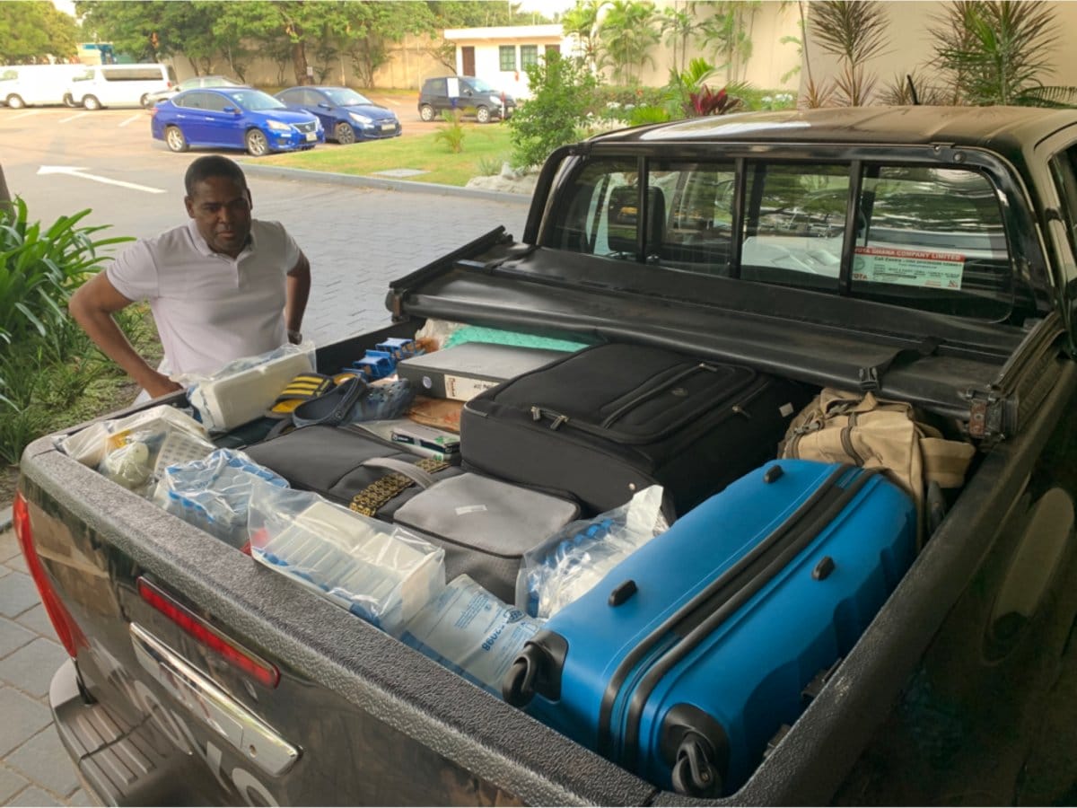 Dr Lucas Amenga-Etego (co-senior author for the study), assessing how to load more equipment into the pickup truck for the 18 hour drive from Accra to Navrongo. (Credit: William Hamilton)